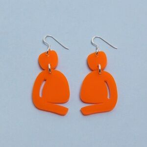WARREN STEVEN SCOTT Orange Opaque Slashed Ovoid Piercec Earrings on Silver Hooks